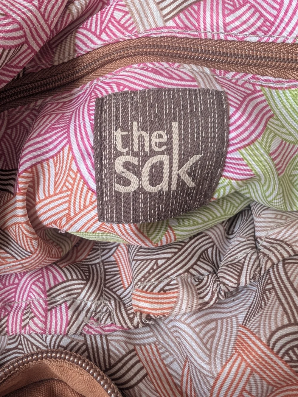 The Sak as sequin from